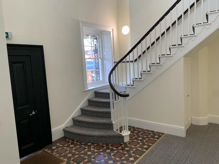 Staircase and hallway within Milford Hill House