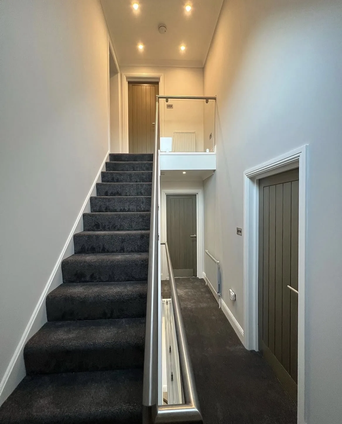 Staircase and landing in the renovated property